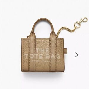 The Nano Tote bag charm by Marc Jacobs. Color Camel